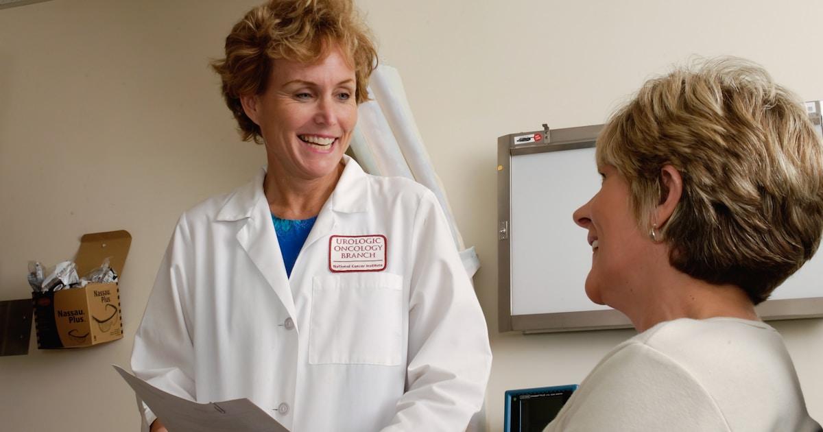 A doctor consulting with a patient in a modern clinic setting